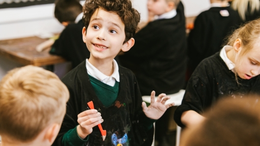 Boy having fun in art class
