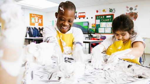 Pupils playing with foam in an art class 
