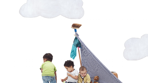 Three children play with a homemade sailboat made from wooden pallets and a checkered cloth sail. One child stands facing away in a green shirt and jeans, while two others sit on the pallet—one holding a toy, the other looking down. Toys like stuffed animals and building blocks are scattered around. The background is plain white with two large, illustrated white clouds.