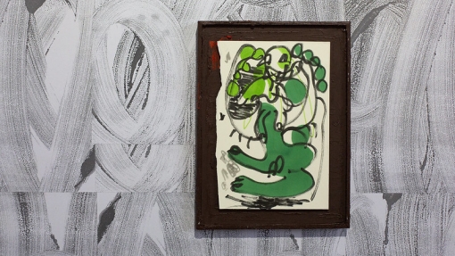 Art work in frame on a painted wall