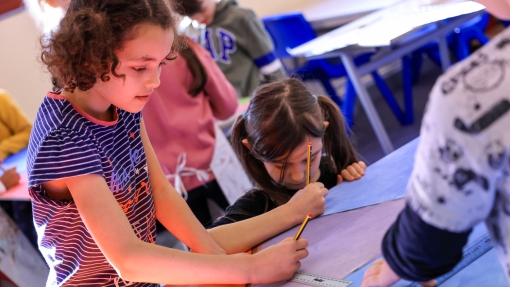 A young girl painting