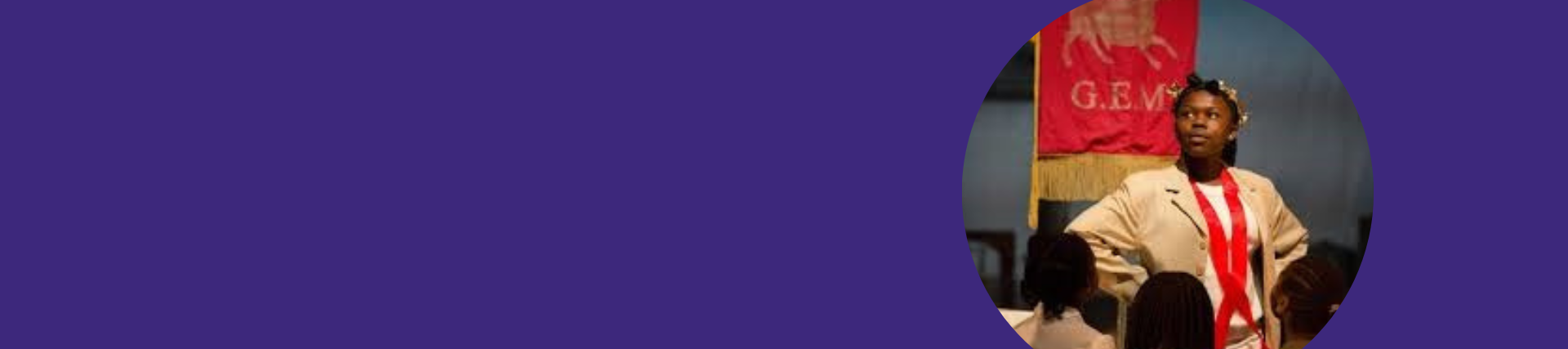 A purple banner with an image of a black male with his arms on his hips in a theatrical manner