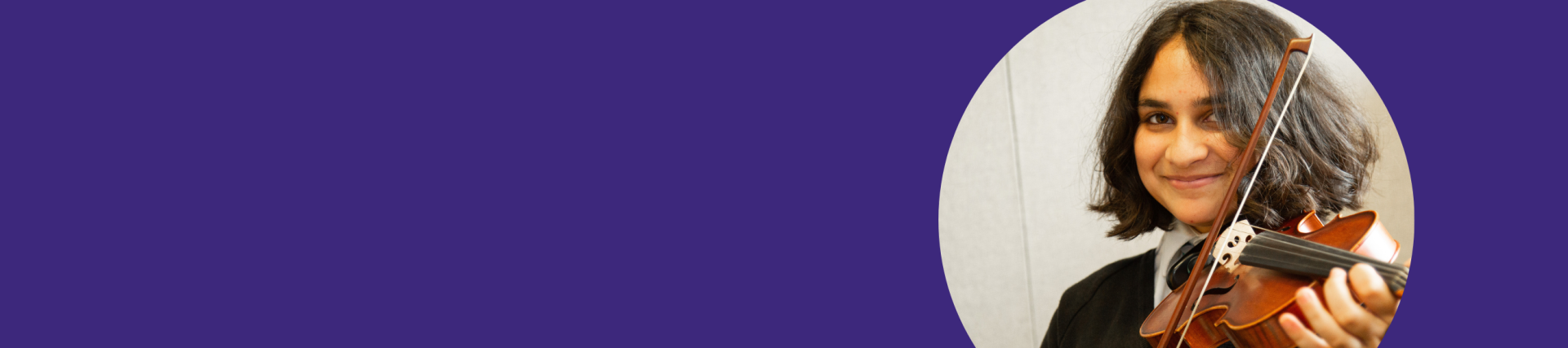 A purple banner with an image on the right of a student playing violin.
