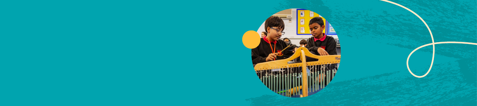 Two boys playing a musical instrument
