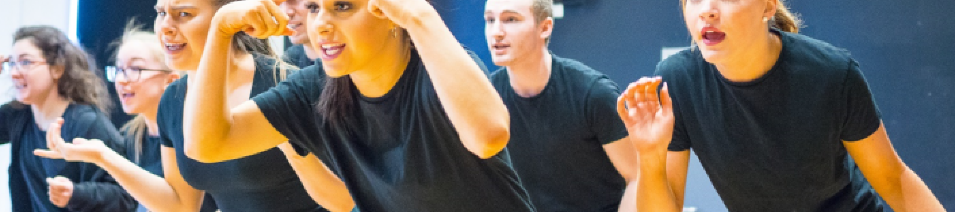 Female group of dancers in black outfits