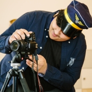 Young people participating in arts activities supported by Southampton Youth Offending Service, image depicts young male taking a photograph 