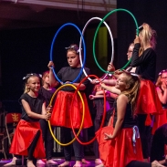 Colourful dance display with props