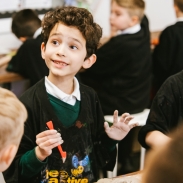 Boy having fun in art class
