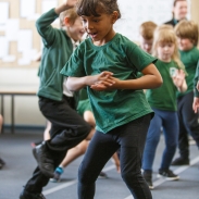 A girl dancing in the classroom